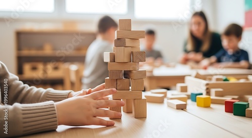 Children playing with a wooden block tower in a preschool or kindergarten classroom children classroom preschool