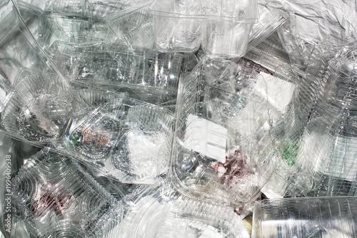 Bild auf Leinwand Close-up top view of a pile of empty transparent plastic food containers and cla