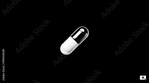 Modern half black and white capsule pill isolated on a pure black background. Minimalist design for medicine and healthcare concepts.