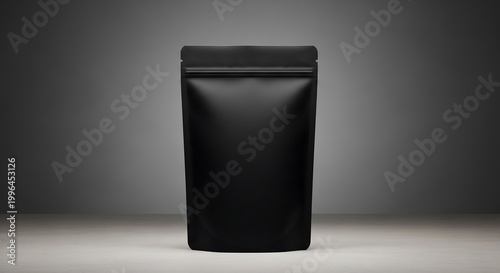 Black standing pouch on concrete slab, packaging photography for modern luxury branding and commercial advertising