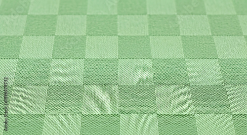 Soft green checkered fabric texture with a subtle tiger stripe pattern embedded in the lower half, suggesting a unique textile design.