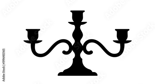 Black silhouette of a vintage three-armed candelabra isolated on white