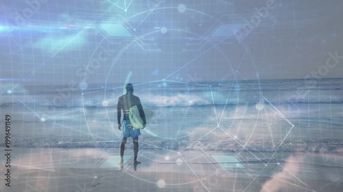 Male surfer with board shifting, stepping into surf to catch waves, tech overlay drifting over him