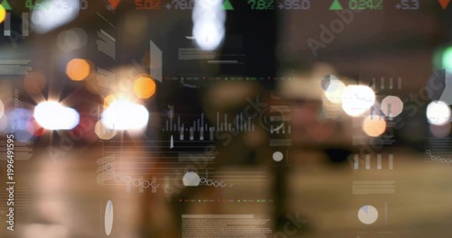 Showing central blurred vehicle lights over urban street at night, with data overlays