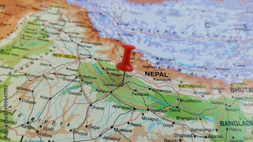 View of Lucknow, is a metropolis and the second largest city of the Indian state of Uttar Pradesh, on a geographical map of Asia, marked with red pushpin