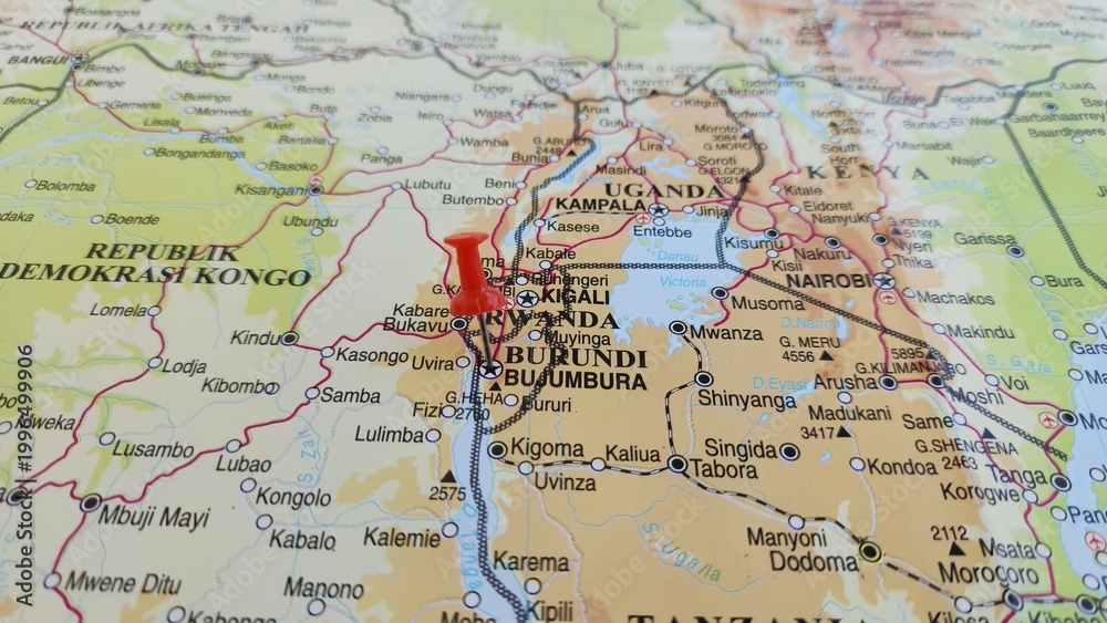 Naklejka premium View of Burundi, officially the Republic of Burundi, is a landlocked country in East Africa, on a geographical map of Africa, marked with red push pin