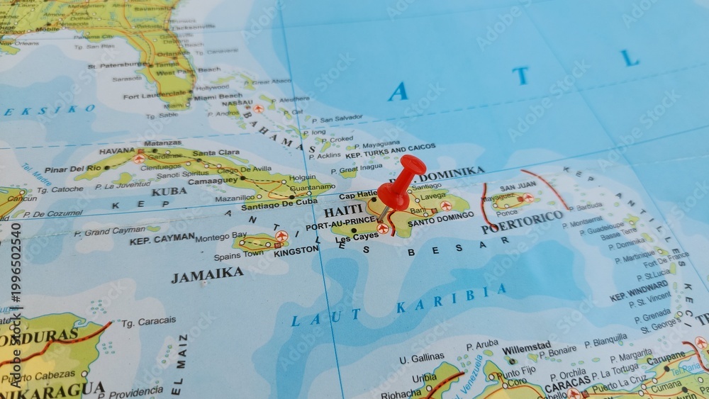 Obraz premium View of Port-au-Prince is the capital and most populous city of Haiti, on a geographical map of America, marked with red push pin