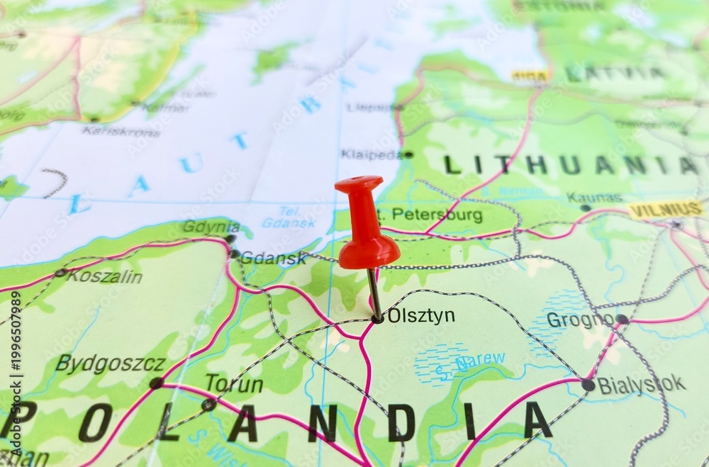 Obraz premium View of Olsztyn, is a city on the Lyna River in northern Poland. It is the capital of the Warmian–Masurian Voivodeship, on a geographical map of Europe, marked with red push pin