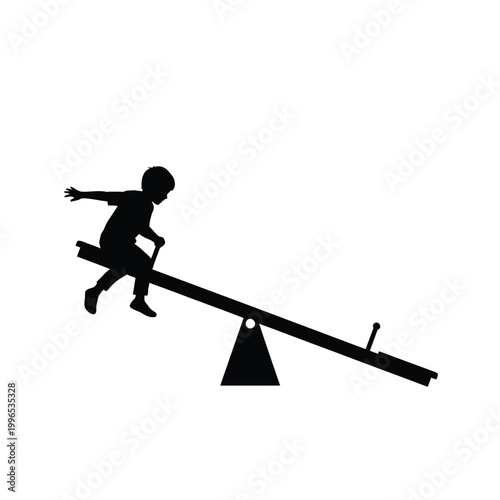 Silhouette of a young boy joyfully riding a seesaw at a playground