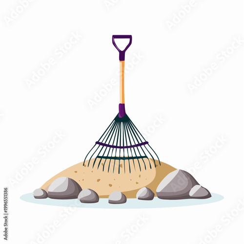Garden Rake in Pile of Sand and Rocks