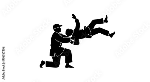 Man kicking another man in silhouette.