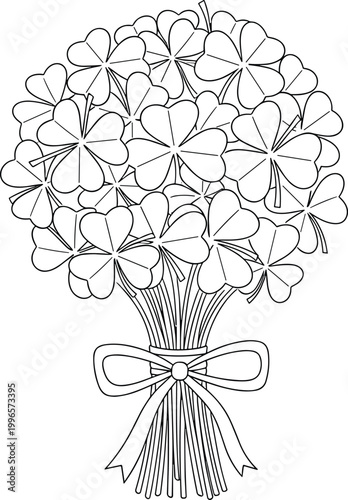 Bouquet of four leaf clovers tied with a ribbon
