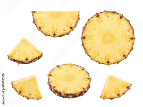 Konstfotografi Vibrant photograph of fresh pineapple slices and wedges, beautifully arranged and isolated on transparent background