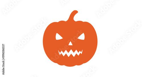 Carved Pumpkin with Spooky Face Design.