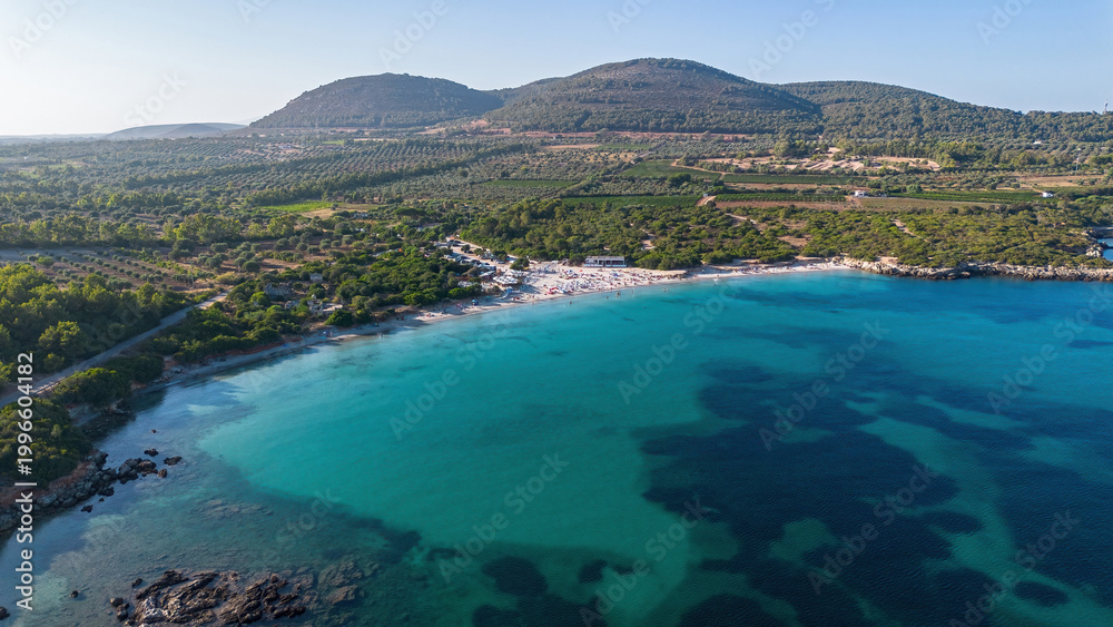 Fototapeta premium Aerial panoramic view of the crowded Lazzaretto beach and bay with crystal clear turquoise waters near Alghero, Sardinia, Italy
