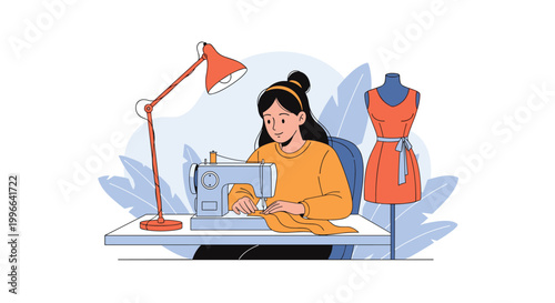 Young female seamstress sitting at a white table and using a modern sewing machine to work on fabric in a creative studio.