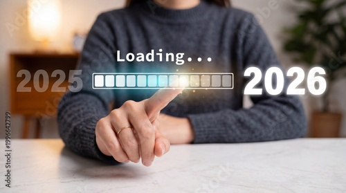 A person waiting for the loading of 2026 from 2025