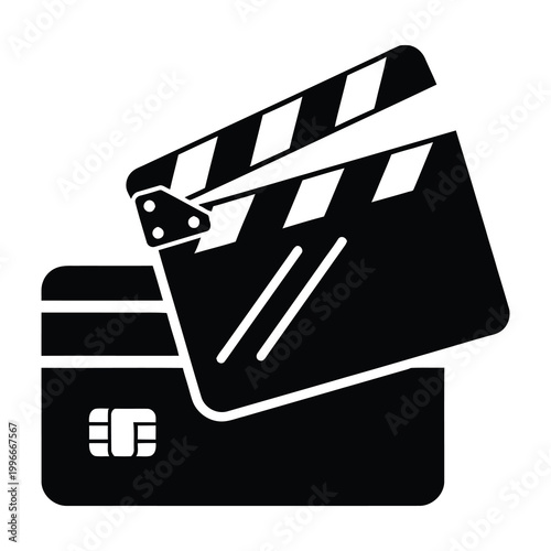 Clapperboard on top of credit card for film production costs