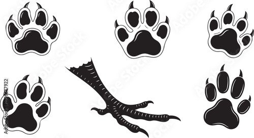 A collection of various black animal footprints, including canine or feline paw prints and three-toed bird tracks, perfect for nature and wildlife themes.