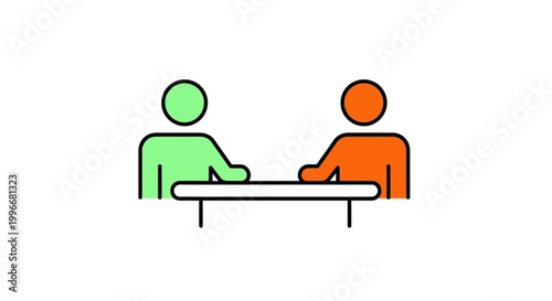 Two People Sitting at Desk.