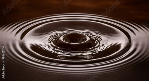 Molten Dark Chocolate Drop Splash Creating Perfect Concentric Ripples