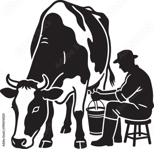 Man milking a cow sitting on a stool
