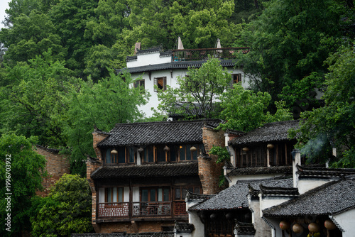 Canvas Print A view of traditional architecture featuring ancient villages nestled among lush