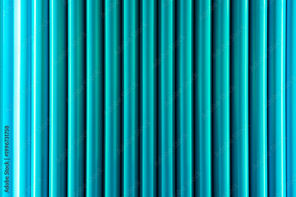 Fototapeta premium a metallic texture with a vertical line pattern, which is commonly used as a background texture or for decorative wall panels