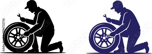Silhouette of a car mechanic working on a vehicle wheel with a wrench tool