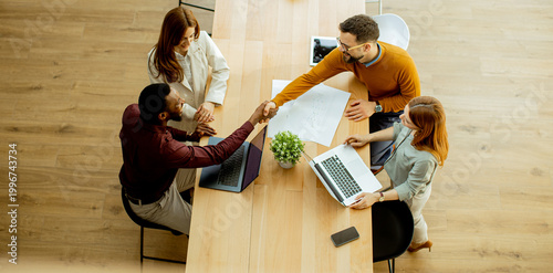 Team meeting in a bright of...