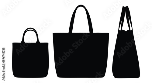 Three black tote bags of varying sizes displayed as a striking silhouette