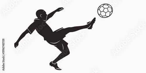 Fényképezés Soccer player in mid-air motion kicking football ball silhouette with football s