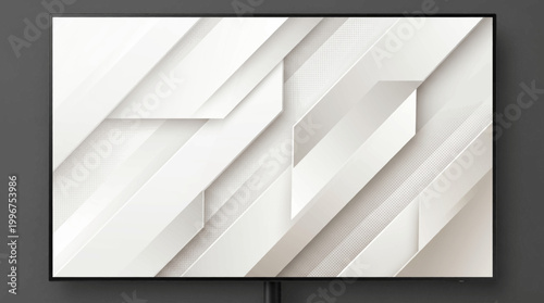A large screen television displaying a modern abstract design on a dark gray background