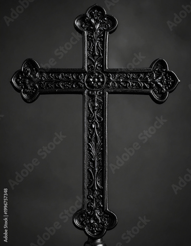 Ornate gothic black metal cross with intricate carvings, dark background, concept of Christian faith, spirituality and devotion, sacred artifact