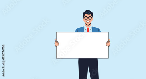 Enthusiastic young businessman wearing glasses and a blue suit holding a large blank white rectangular board for custom advertising.