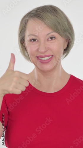 Thumbs Up by Old Woman on White Background, Vertical Video