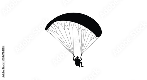 A black silhouette of a paraglider soaring through the air silhouette