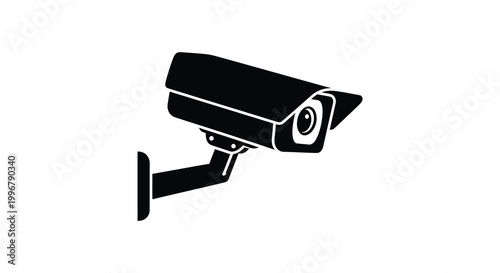 A black security camera is mounted on a wall distinctly shown as a silhouette