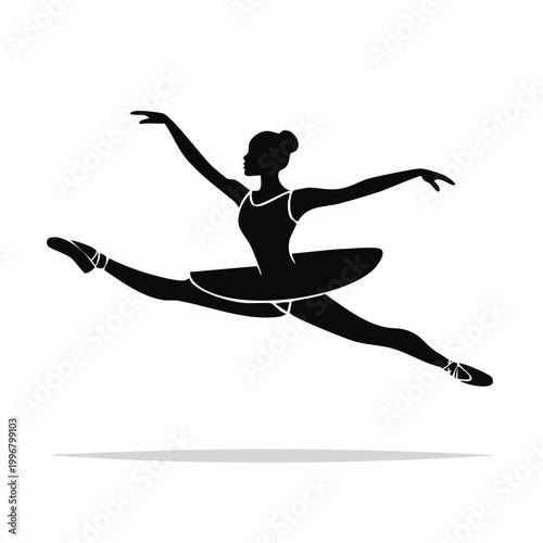 Silhouette of a ballerina performing a split leap