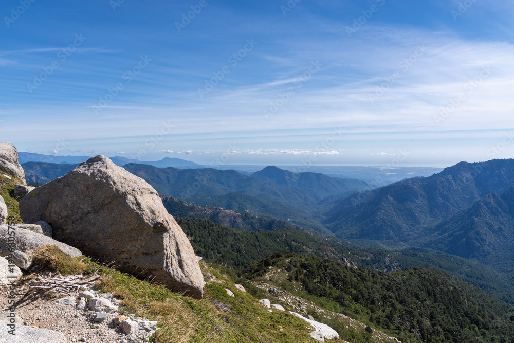 Fototapeta premium Mountain peaks and valleys with sky over Ghisoni, Corsica