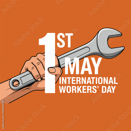 hand holding wrench with international workers day text