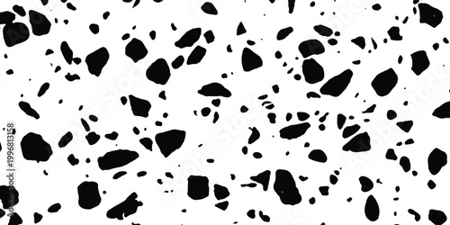 Black terrazzo stone pattern with small scattered rock pieces and organic shapes