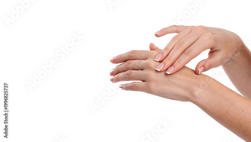 Tableau sur toile Hands are being treated with lotion in a bright room during the day in a skincar