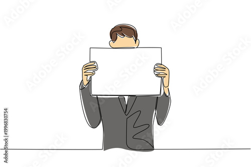 Continuous line drawing of young businessman in suit hiding behind blank sign, show personal shyness concept. Ideal for introvert meme, anonymous feedback, privacy notice, and funny office content