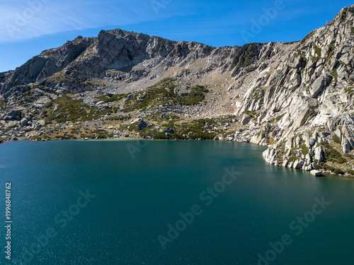Lac de Bastani mountain lake in Corsican wilderness