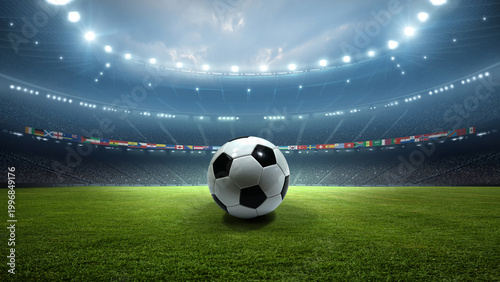 Soccer ball on the pitch with national flags in stadium at night. An imaginary stadium is modelled and rendered.
