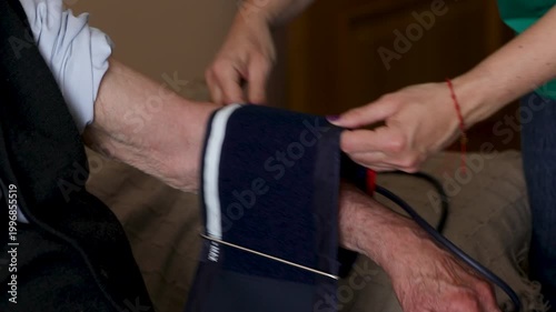healthcare for the elderly_4k video of a healthcare professional taking the blood pressure of a senior woman