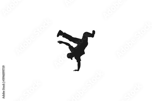 Male breakdancer performing a handstand freeze move silhouette