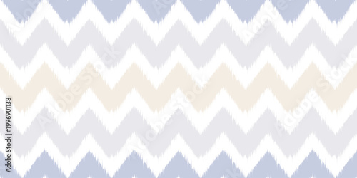 Ethnic seamless pattern with ikat geometric motif. Abstract vector rug textured traditional zigzag background. Chevron ornament for fabric textile and carpet.