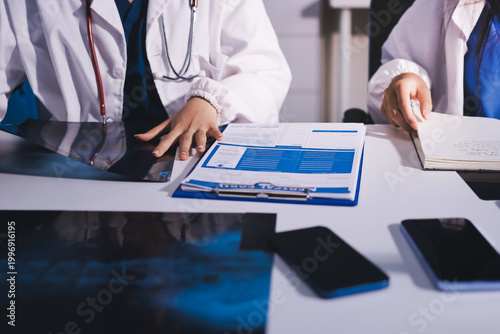 Medical Team Meeting, Doctors Taking Notes During Briefing Session
